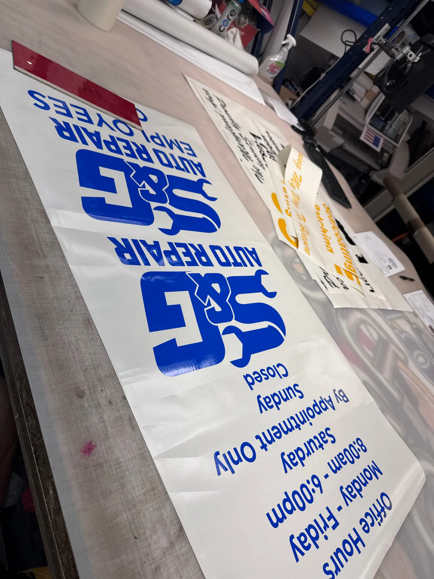 Custom vinyl cut layout for SG Auto Repair shop signage in Delaware